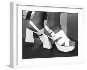 Close-Up Photograph of Feet in a Pair of White Platform Sandals-null-Framed Photographic Print