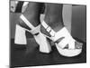 Close-Up Photograph of Feet in a Pair of White Platform Sandals-null-Mounted Photographic Print