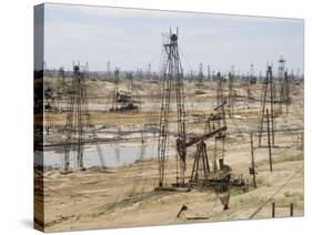 Closely Spaced Drilling Towers and Nodding Donkey Beam Pumps, Ramana Oilfield, Baku, Azerbaijan-Waltham Tony-Stretched Canvas