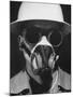 Closeup a A Man Wearing a Safety Helmet, Mask and Goggles-Andreas Feininger-Mounted Photographic Print