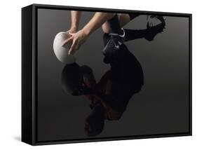 Closeup Low Section and Reflection of a Rugby Player Kneeling on One Knee with Ball-Nosnibor137-Framed Stretched Canvas