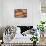 Closeup of a Pile of Old Books and an Old Alarm Clock on a Desk, with a Retro Effect-nito-Framed Stretched Canvas displayed on a wall