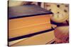 Closeup of a Pile of Old Books and an Old Alarm Clock on a Desk, with a Retro Effect-nito-Stretched Canvas