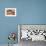 Closeup of a Pile of Old Books and an Old Alarm Clock on a Desk, with a Retro Effect-nito-Framed Photographic Print displayed on a wall