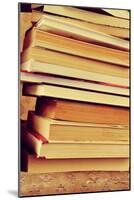 Closeup of a Piles of Books, with a Retro Effect-nito-Mounted Photographic Print