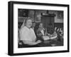 Closeup of a Russian Woman Sitting in the Renaissance Bar Smoking a Cigarette-null-Framed Photographic Print