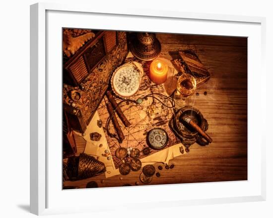 Closeup of Pirates Booty on Wooden Table, Cigars Smoke, Glass of Wine, Map with Way to Search Treas-Anna Omelchenko-Framed Photographic Print