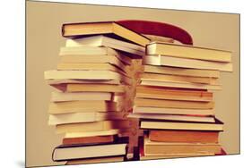 Closeup of Some Piles of Books on a Chair, with a Retro Effect-nito-Mounted Photographic Print