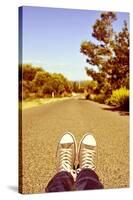 Closeup of the Feet of a Man Lying down on a Road-nito-Stretched Canvas