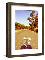 Closeup of the Feet of a Man Lying down on a Road-nito-Framed Photographic Print