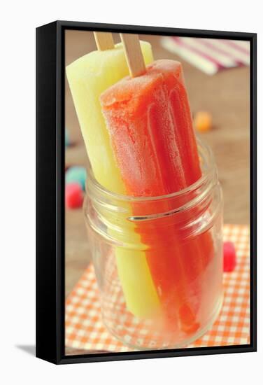 Closeup of Two Appetizing Ice Pops of Different Flavors in a Glass Jar-nito-Framed Stretched Canvas