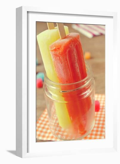 Closeup of Two Appetizing Ice Pops of Different Flavors in a Glass Jar-nito-Framed Photographic Print