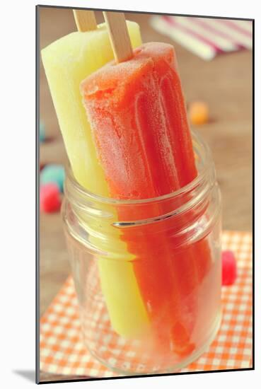 Closeup of Two Appetizing Ice Pops of Different Flavors in a Glass Jar-nito-Mounted Photographic Print