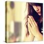 Closeup Portrait of a Young Caucasian Woman Praying-B-D-S-Stretched Canvas