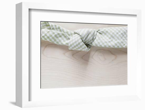 Cloth Napkin with Node on Wood-Petra Daisenberger-Framed Photographic Print