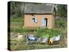 Clothes Drying on a Clothesline in Front of a House, Madagascar-null-Stretched Canvas