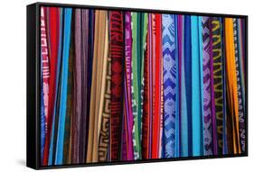 Cloths, Blankets, Scarves, and Hammocks Hang on Display at the Otavalo Market, in Otavalo, Ecuador-Karine Aigner-Framed Stretched Canvas