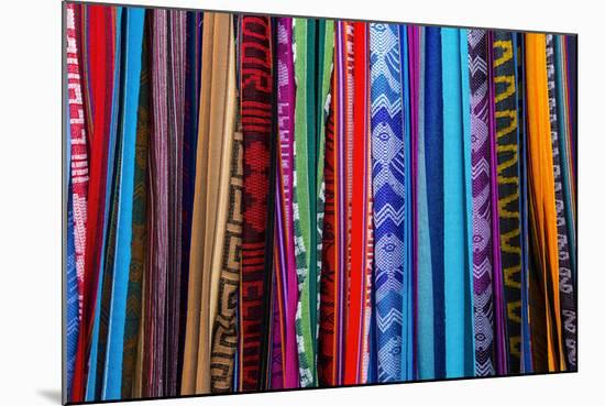 Cloths, Blankets, Scarves, and Hammocks Hang on Display at the Otavalo Market, in Otavalo, Ecuador-Karine Aigner-Mounted Photographic Print