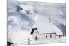 Clouds Above the Mountain Huts and Church Covered with Snow, Bettmeralp, District of Raron-Roberto Moiola-Mounted Premium Photographic Print