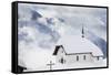 Clouds Above the Mountain Huts and Church Covered with Snow, Bettmeralp, District of Raron-Roberto Moiola-Framed Stretched Canvas