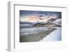 Clouds at sunset over mountain peak covered with snow and icy Skagsanden beach, Flakstad-Roberto Moiola-Framed Photographic Print