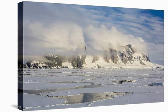 Clouds Forming over Snow-Capped Mountains in Penola Strait, Antarctica, Polar Regions-Michael Nolan-Stretched Canvas