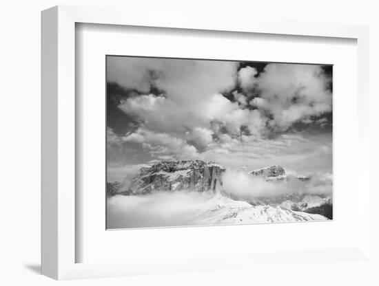 Clouds hang between the mountains of the Dolomites-Jean Schwarz-Framed Photographic Print