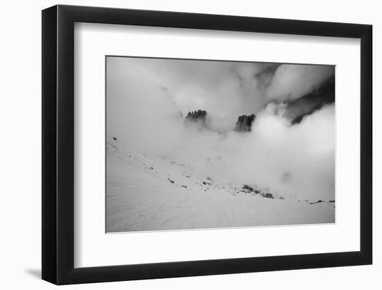 Clouds hang between the mountains of the Dolomites-Jean Schwarz-Framed Photographic Print