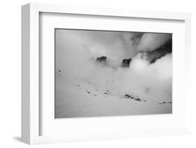 Clouds hang between the mountains of the Dolomites-Jean Schwarz-Framed Photographic Print