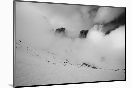 Clouds hang between the mountains of the Dolomites-Jean Schwarz-Mounted Photographic Print