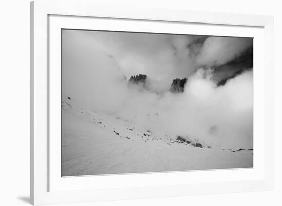 Clouds hang between the mountains of the Dolomites-Jean Schwarz-Framed Photographic Print