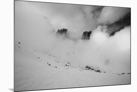 Clouds hang between the mountains of the Dolomites-Jean Schwarz-Mounted Photographic Print