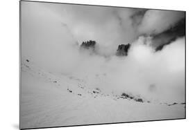 Clouds hang between the mountains of the Dolomites-Jean Schwarz-Mounted Photographic Print