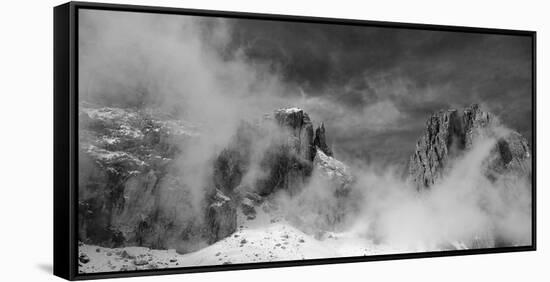 Clouds hang between the mountains of the Dolomites-Jean Schwarz-Framed Stretched Canvas