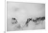 Clouds hang between the mountains of the Dolomites-Jean Schwarz-Framed Photographic Print