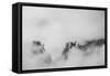 Clouds hang between the mountains of the Dolomites-Jean Schwarz-Framed Stretched Canvas