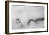 Clouds hang between the mountains of the Dolomites-Jean Schwarz-Framed Photographic Print