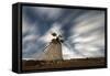 Clouds in the starry sky over a traditional windmill, La Oliva, Fuerteventura, Canary Islands-Roberto Moiola-Framed Stretched Canvas