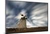 Clouds in the starry sky over a traditional windmill, La Oliva, Fuerteventura, Canary Islands-Roberto Moiola-Mounted Photographic Print