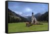 Clouds on Church of Ranui surrounded by meadows and woods in the fall, St. Magdalena, Funes Valley,-Roberto Moiola-Framed Stretched Canvas