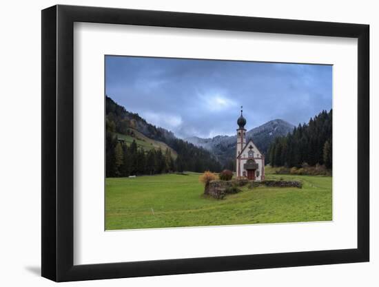 Clouds on Church of Ranui surrounded by meadows and woods in the fall, St. Magdalena, Funes Valley,-Roberto Moiola-Framed Premium Photographic Print