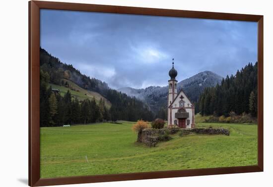 Clouds on Church of Ranui surrounded by meadows and woods in the fall, St. Magdalena, Funes Valley,-Roberto Moiola-Framed Photographic Print