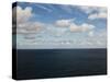 Clouds over Calm Sea-Norbert Schaefer-Stretched Canvas