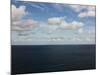 Clouds over Calm Sea-Norbert Schaefer-Mounted Photographic Print