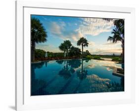 Clouds reflected in the infinity pool at sunrise, Aureum Palace Hotel, Bagan, Mandalay Region, M...-null-Framed Photographic Print