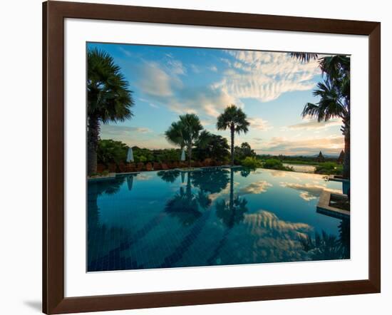 Clouds reflected in the infinity pool at sunrise, Aureum Palace Hotel, Bagan, Mandalay Region, M...-null-Framed Photographic Print