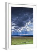 Clouds with sun rays streaming down on Masai Mara in Kenya, Africa.-Larry Richardson-Framed Photographic Print