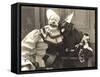 Clown Posing with Dog Dressed in Clown Costume-null-Framed Stretched Canvas