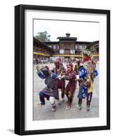 Clowns in Carved Wooden Masks Entertaining Spectators at the Wangdue Phodrang Tsechu, Wangdue Phodr-Lee Frost-Framed Photographic Print