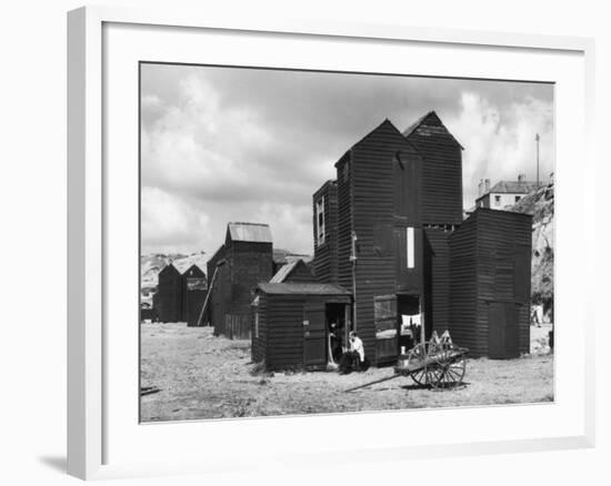 Clustered on the Shingle of the Old Town of Hastings Sussex are These Tall Black Huts-Fred Musto-Framed Photographic Print